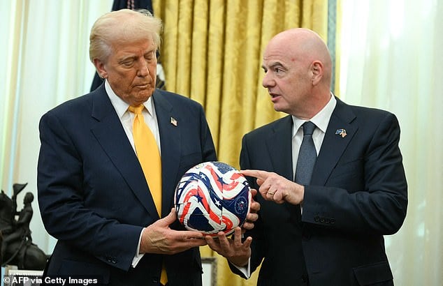 The President was joined by FIFA head honcho Gianni Infantino (R) in the Oval Office